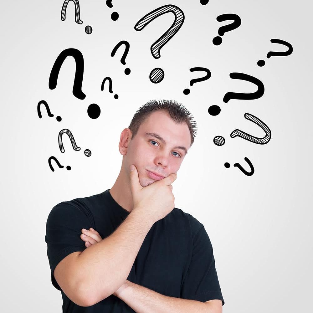 Man with question mark over head looking thoughtful